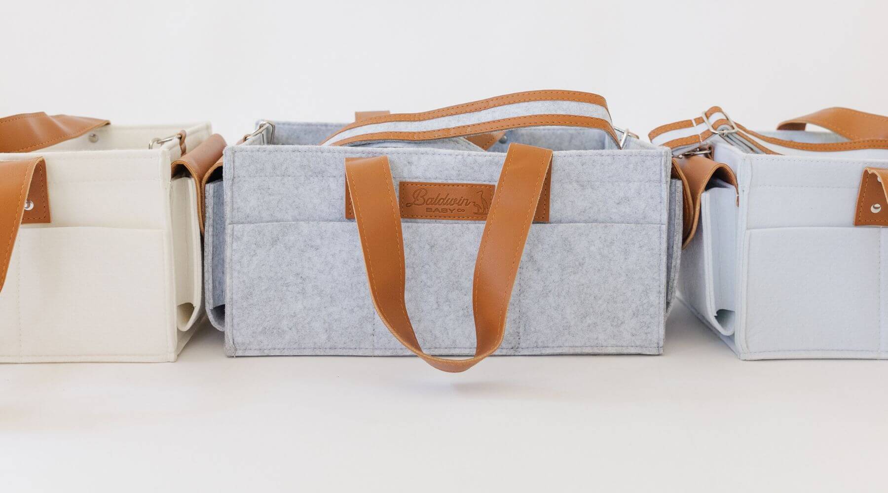 Organize Your Nursery in Style with Elegant Diaper Caddies