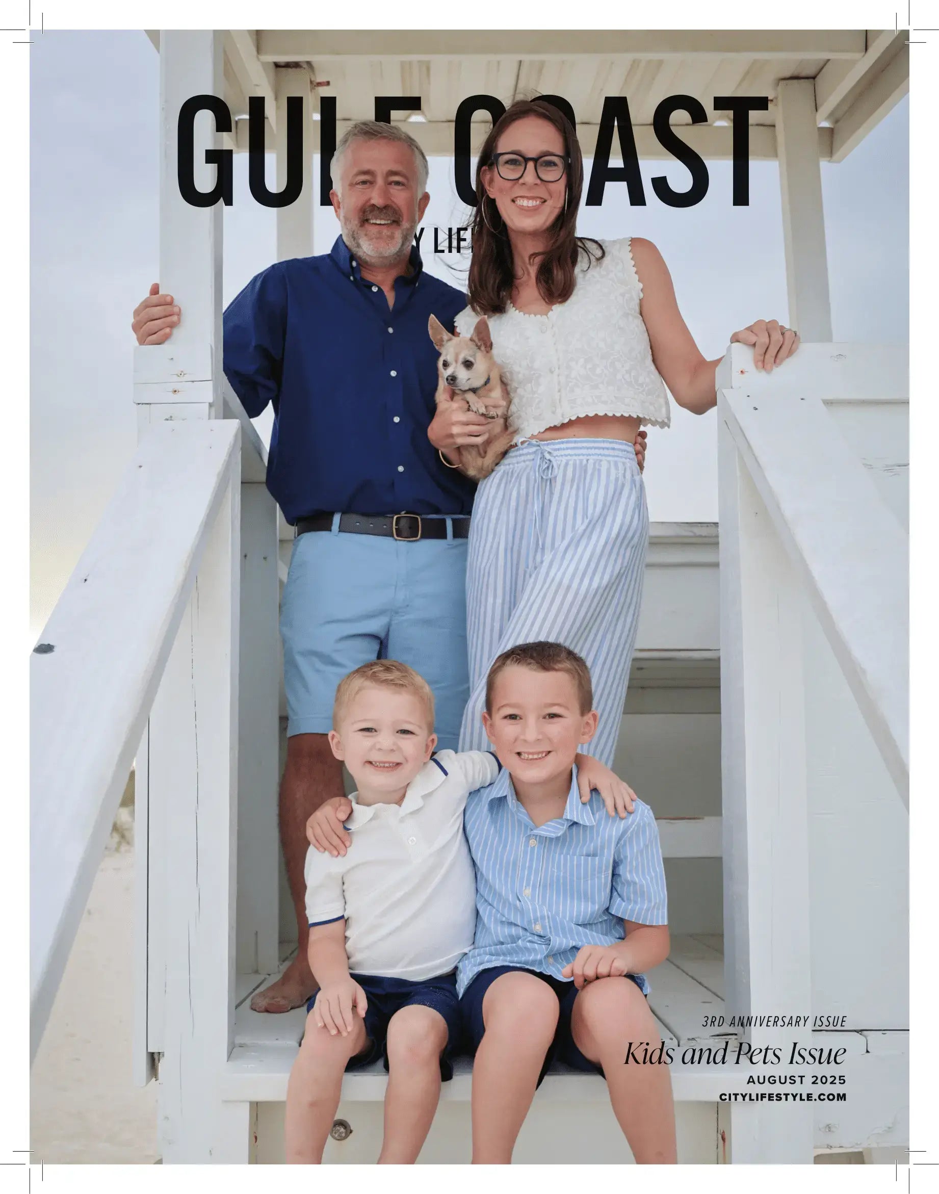 Mackenzie McAteer, founder of Baldwin Baby Co, on the August 2025 cover of Gulf Coast City Lifestyle magazine, standing with her husband Trae, their two young sons, and their Chihuahua on a lifeguard stand at the beach. The issue is titled “Kids and Pets.”