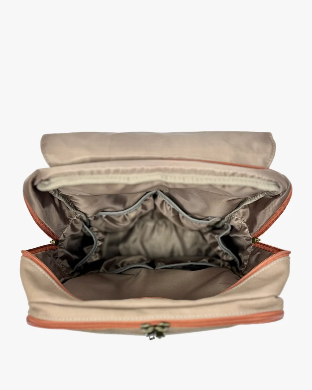 Open beige canvas diaper backpack with beige lining, compartments, and elastic pockets