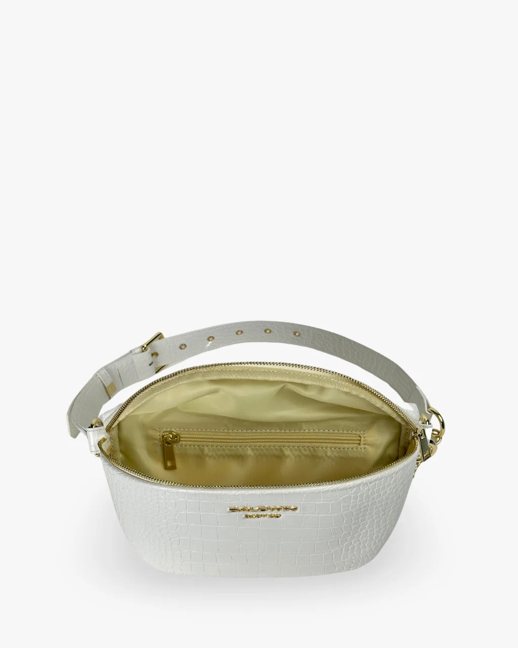 Interior of white faux croc belt bag with ivory satin lining and zippered pocket