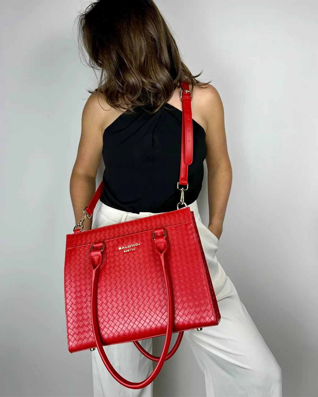 Cardinal Montrose diaper tote with bold red color and quilted design for modern parents