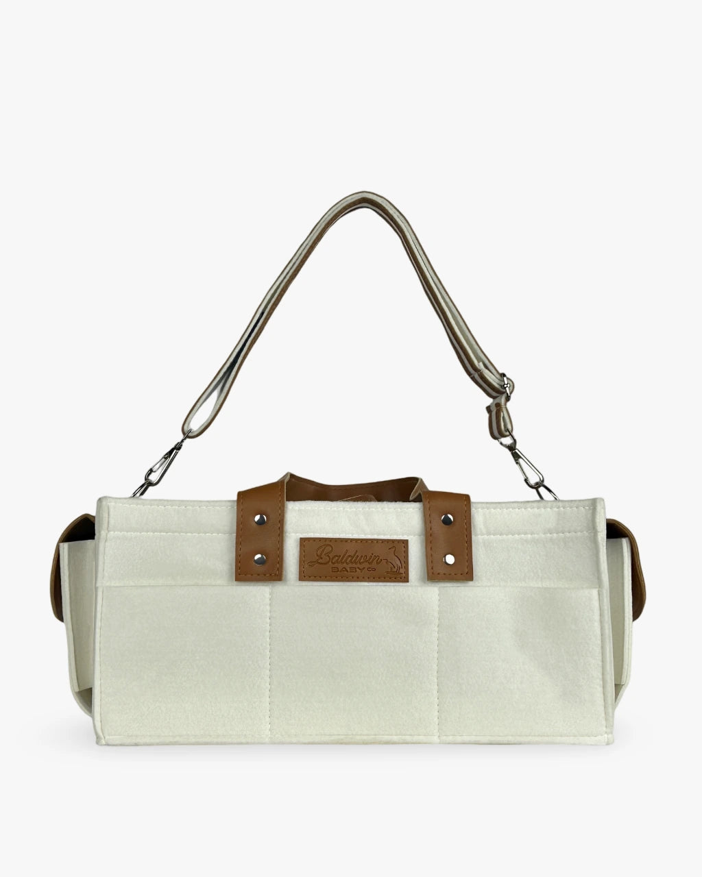 creamy white diaper caddy made of felt with leather accents and straps