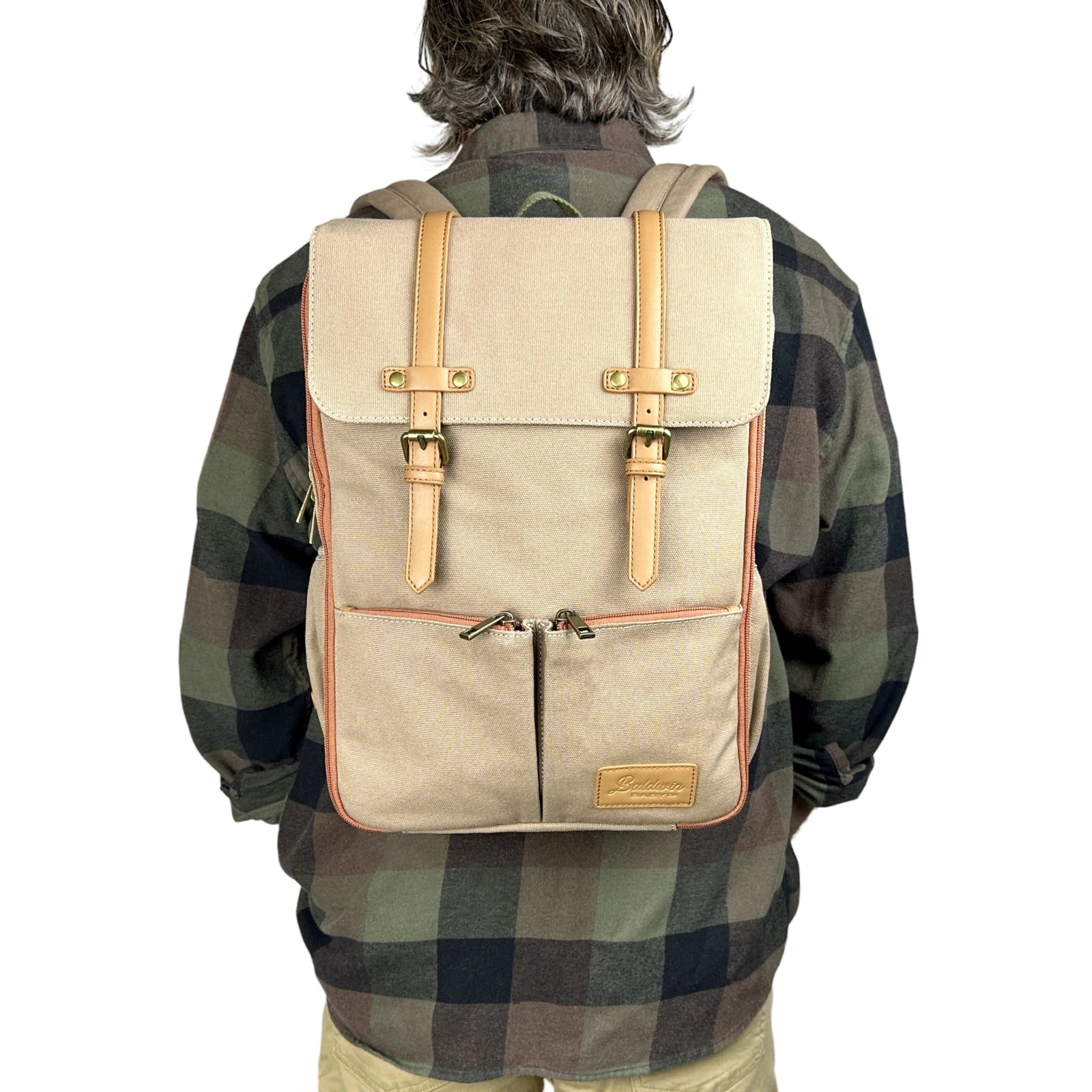 man modeling canvas diaper bag backpack