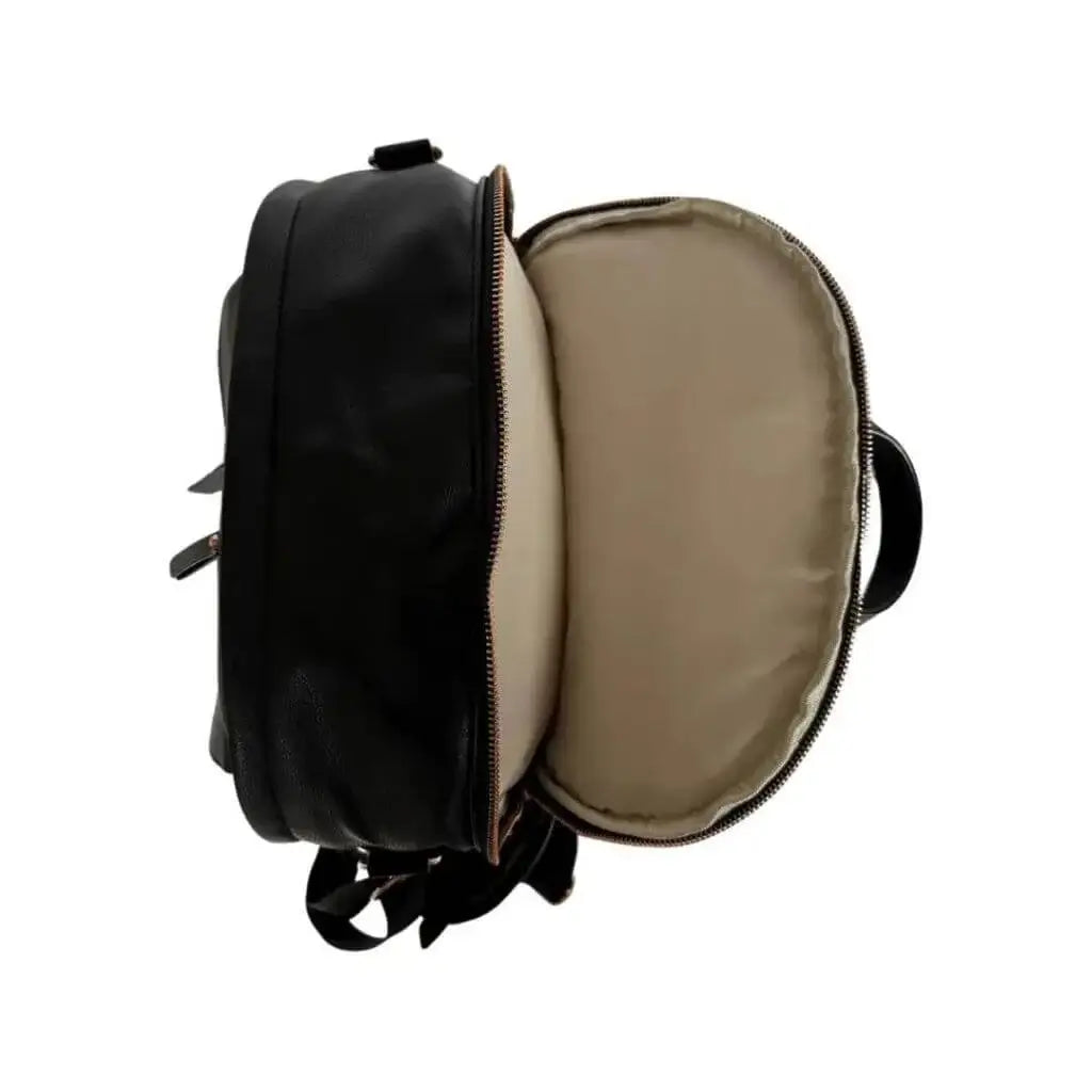 Overhead view of black leather backpack diaper bag with unzipped laptop compartment