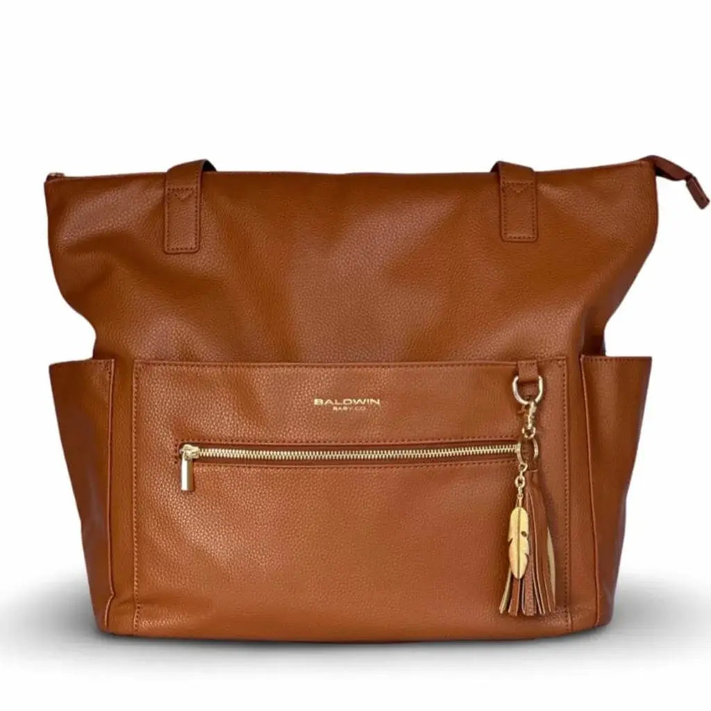 Brown leather diaper bag with leather and gold feather tassel