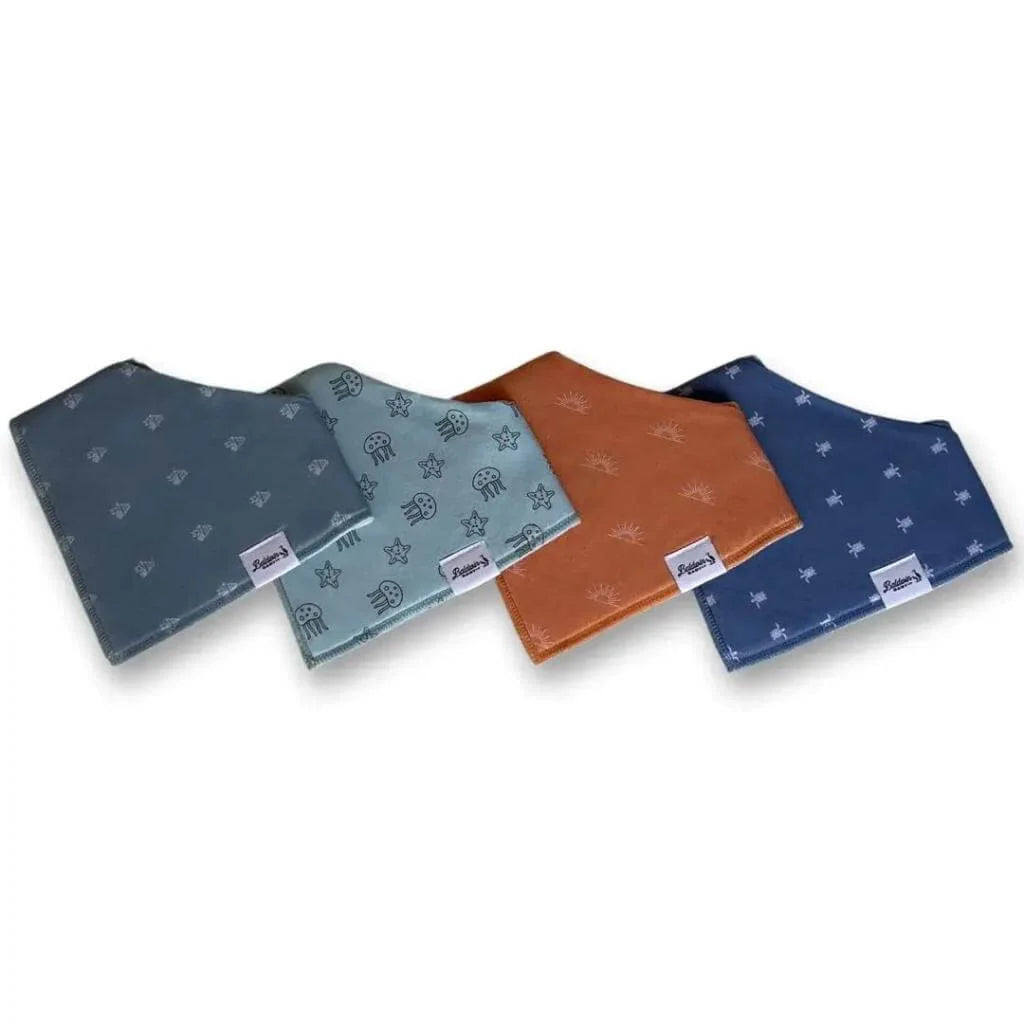 Set of four bandana bibs by Baldwin Baby Company. Steel blue with hermit crabs, light blue with starfish and jelly fish, orange with sunsets, and navy with sea turtles