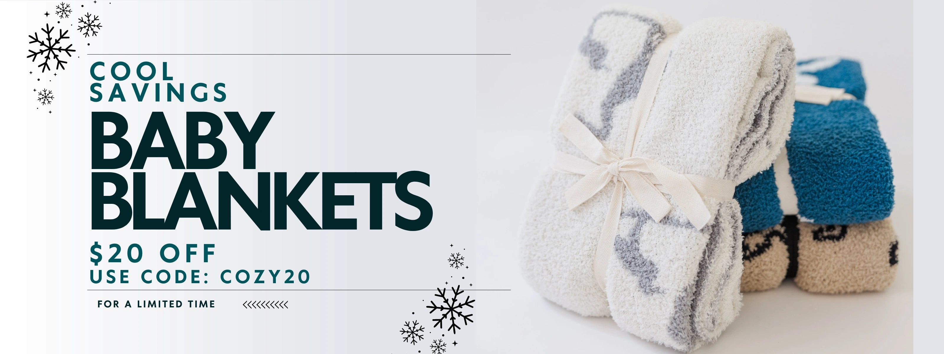 Promo banner for Baldwin Baby Co. offering $20 off baby blankets with code 'COZY20.' Features soft, plush blankets in white, blue, and beige tied with a ribbon